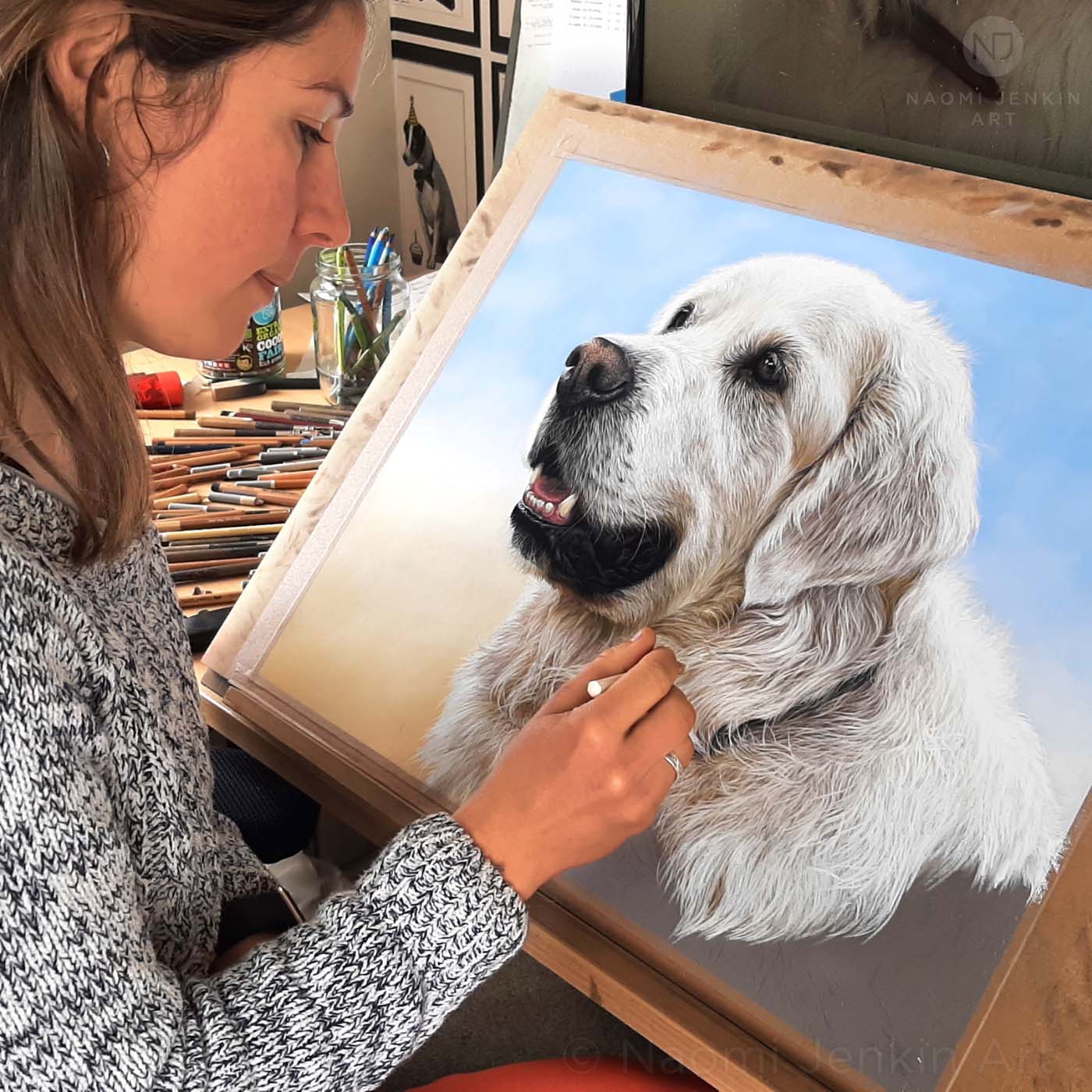 Naomi Jenkin drawing dog portrait of a golden retriever.